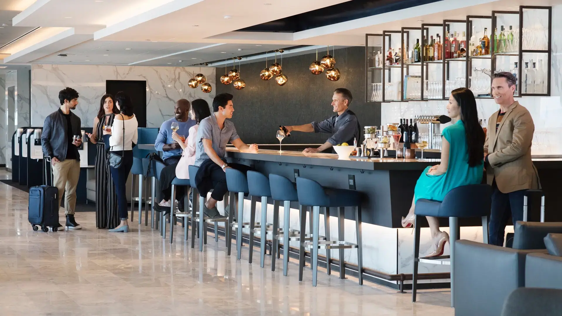 people at the bar United Airlines - Polaris Lounge, George Bush Intercontinental Airport