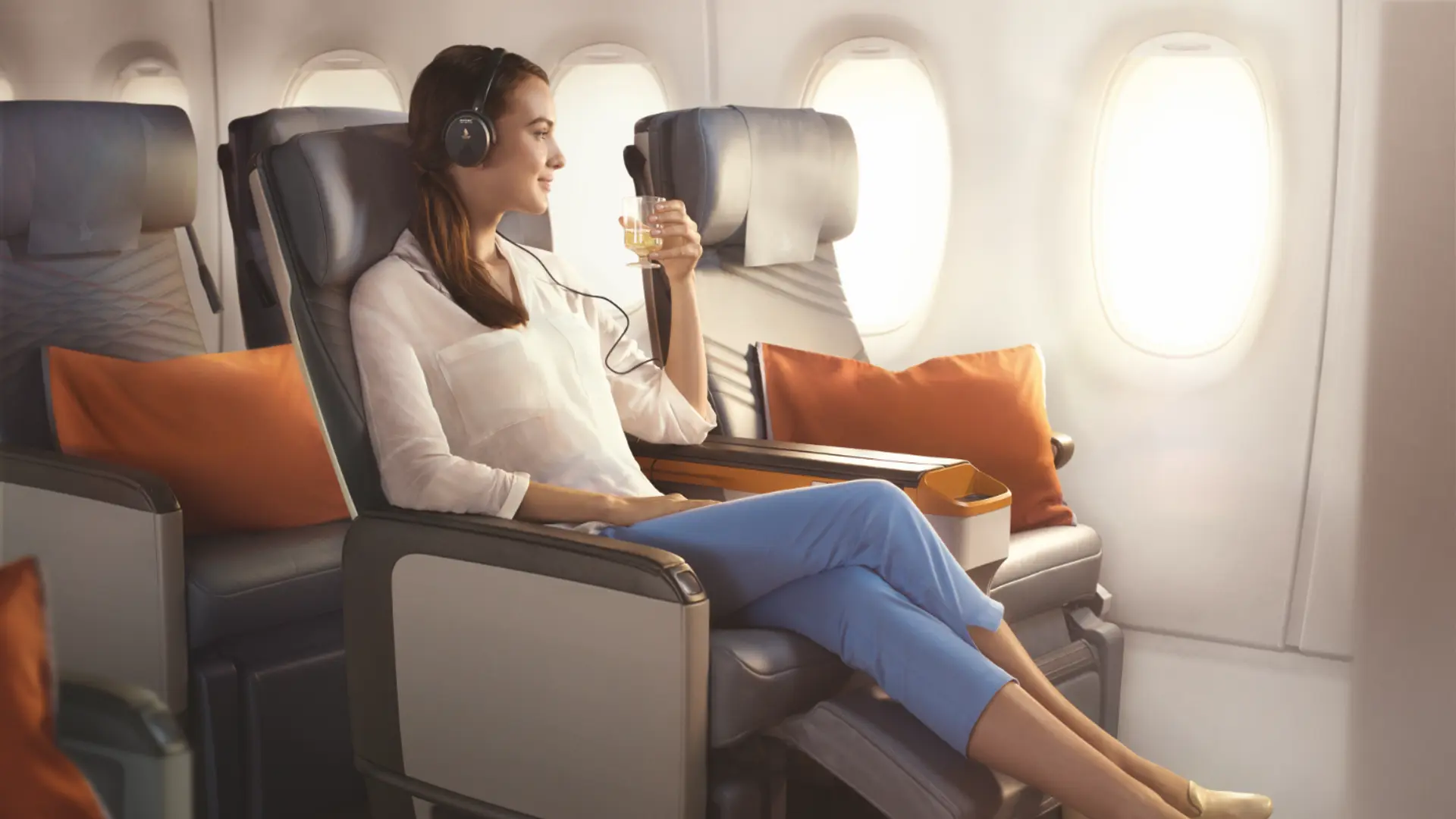 woman sitting in premium economy 